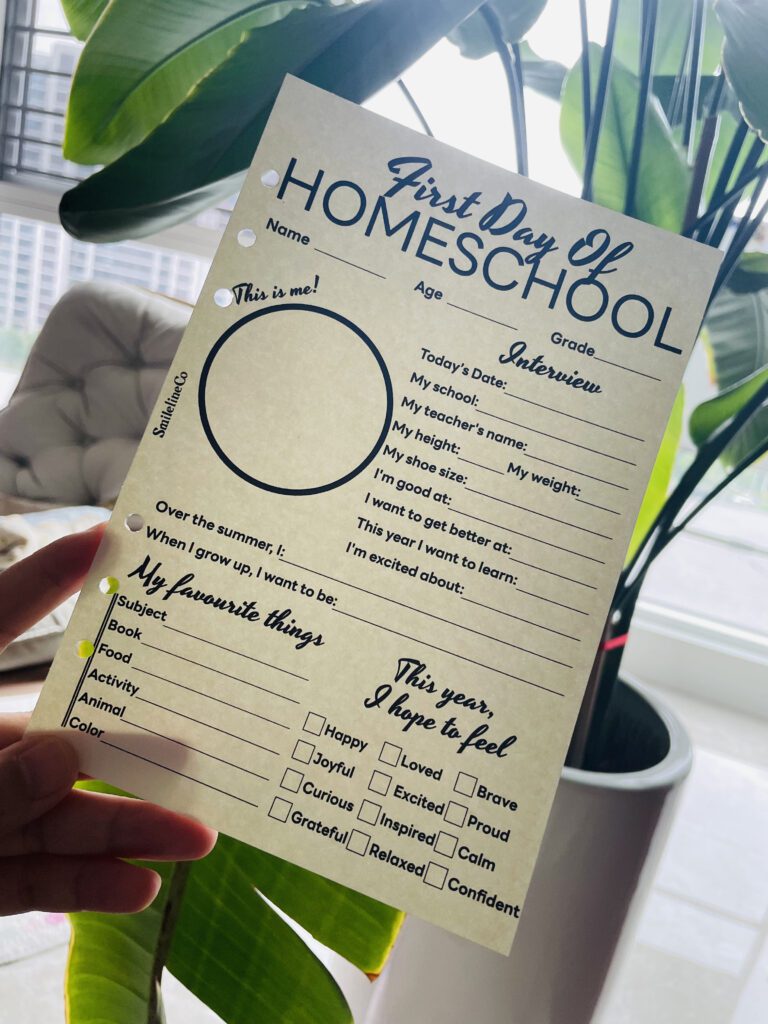 Cozy morning by the window while filling out a first day of homeschool keepsake page