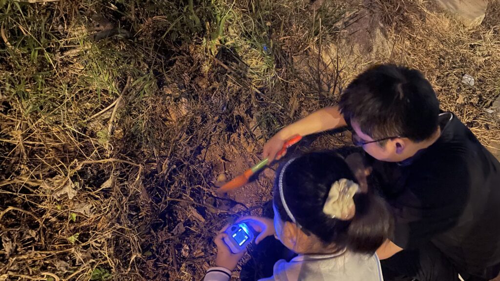 Our family saying goodbye as we bury the little yellow duck we brought home from the farm