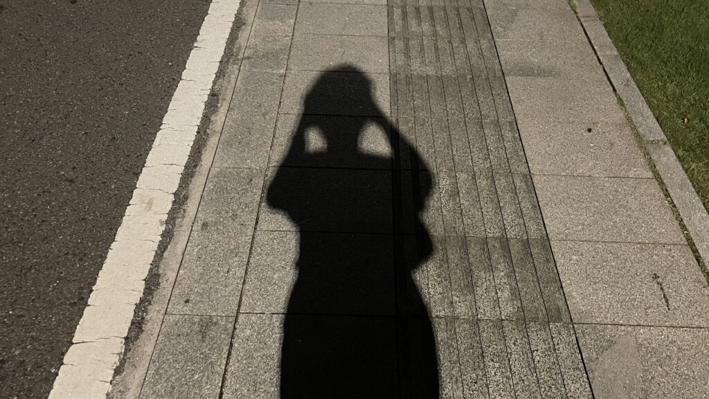 Family shadows during an evening bike ride at Songya Lake