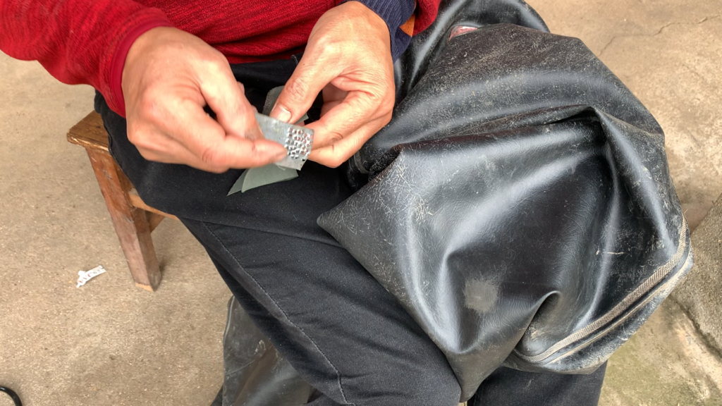 National Day in rural China: Dad repairing his old waders at our family home in Hunan