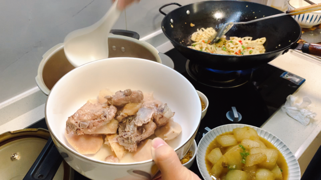 Taro and pork rib soup simmering for a Chinese family dinner