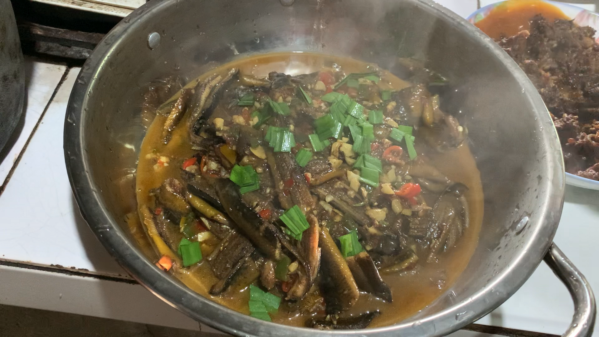 Mom’s stir-fried rice field eel with peppers and garlic