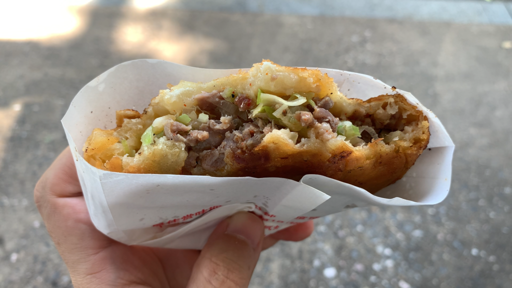 Tianma beef pie and a cup of iced lychees at a Chinese street food stall-1